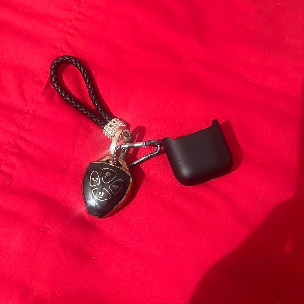 Black keychain with ouija board